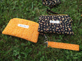 Golden Flowers Wristlet